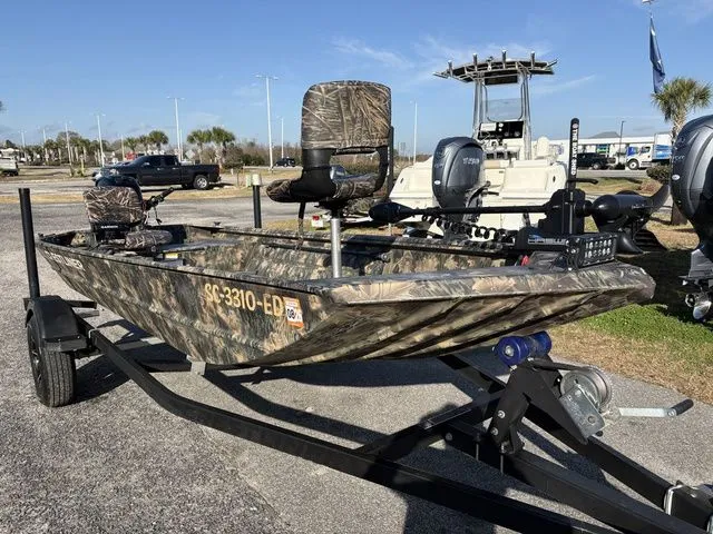 Slide: The Image of 2022 Crestliner 1546 Retriever Jon boat on trailer, parked outdoors. - 6