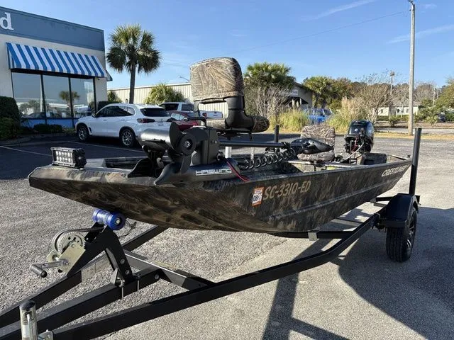Slide: The Image of 2022 Crestliner 1546 Retriever Jon boat on trailer outdoors. - 8