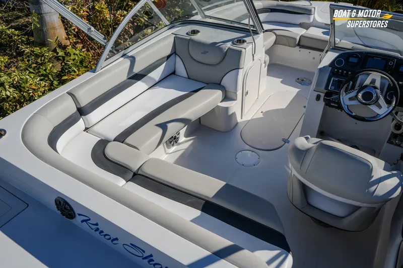 Slide: The Image of 2018 Starcraft MDX 190 O/B boat interior with plush seating and modern dashboard. - 15