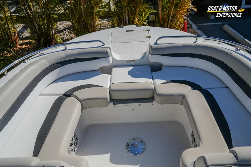 Slide: The Image of 2018 Starcraft MDX 190 O/B boat interior with cushioned seating and sleek design. - 26