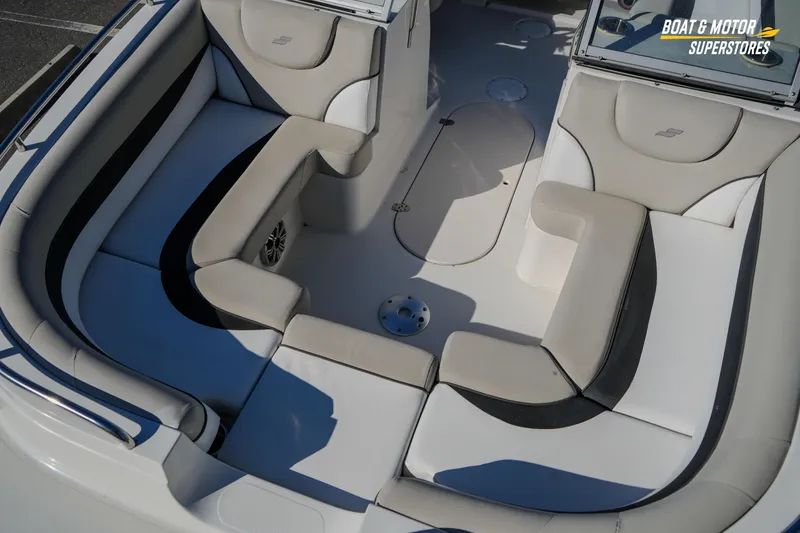 Slide: The Image of 2018 Starcraft MDX 190 O/B boat interior with cushioned seating and modern design. - 28