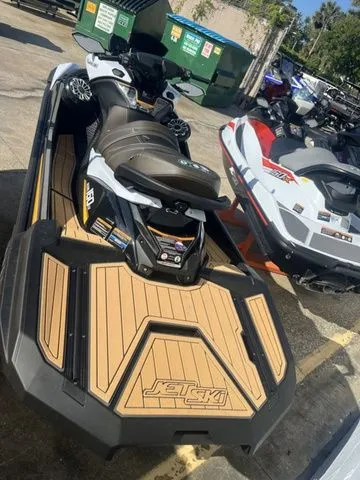 Slide: The Image of 2026 Kawasaki Jet Ski Ultra 160 parked outdoors. - 4
