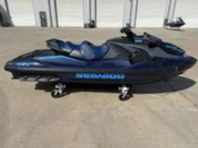 Slide: The Image of 2026 Sea-Doo GTX jet ski parked outdoors. - 17