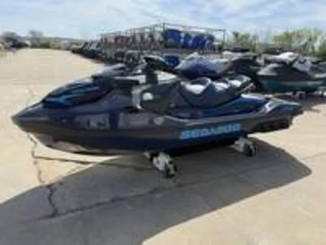 Slide: The Image of 2026 Sea-Doo GTX jet ski parked outdoors. - 3
