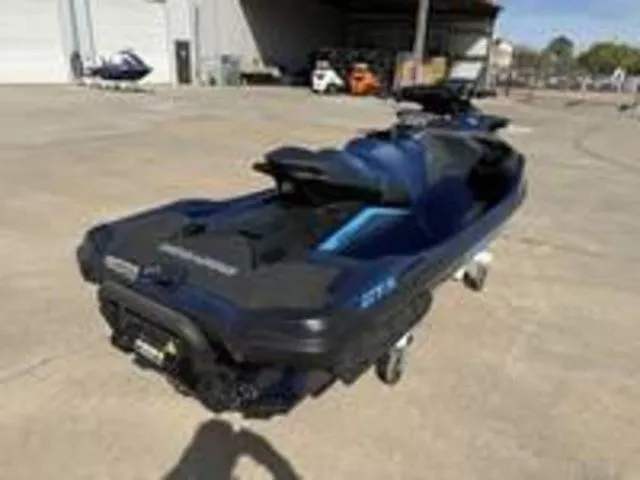 Slide: The Image of 2026 Sea-Doo GTX jet ski parked outdoors. - 5
