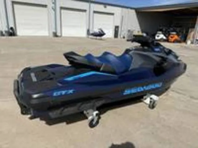Slide: The Image of 2026 Sea-Doo GTX jet ski parked outdoors. - 6