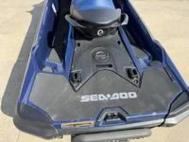 Slide: The Image of 2026 Sea-Doo GTX jet ski in blue on concrete surface. - 8