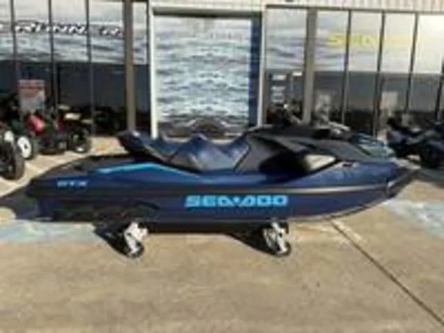 Slide: The Image of 2026 Sea-Doo GTX 230 jet ski with audio and iDF technology. - 14