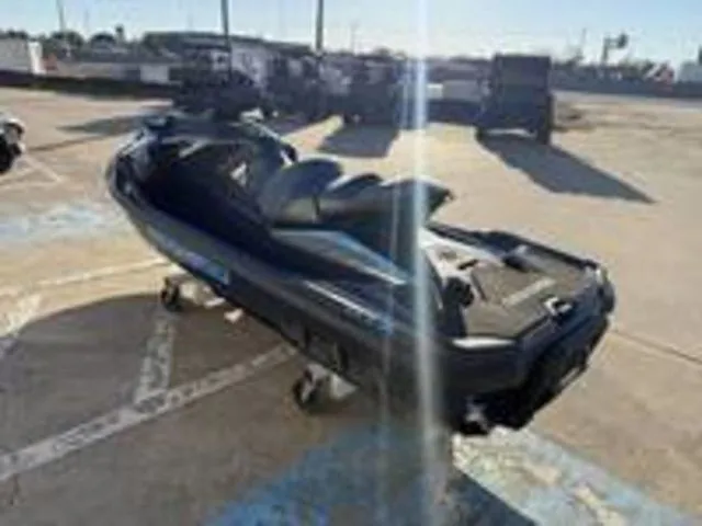 Slide: The Image of 2026 Sea-Doo GTX 230 jet ski on parking lot. - 5
