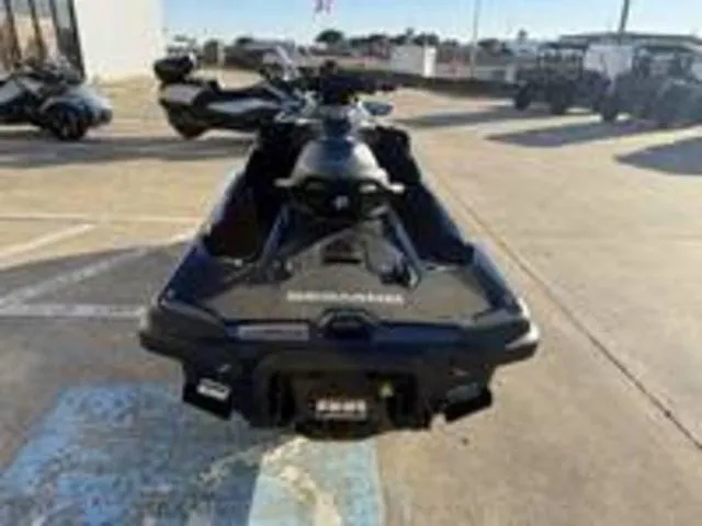 Slide: The Image of 2026 Sea-Doo GTX 230 jet ski in parking lot, rear view. - 6