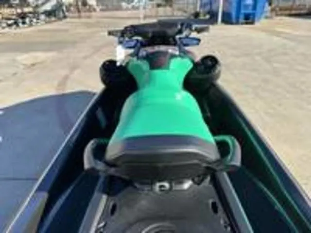 Slide: The Image of 2026 Sea-Doo GTI SE 130 in green on a trailer. - 13