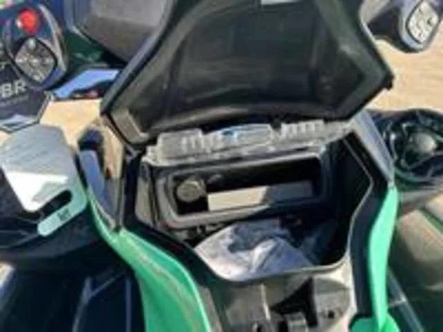 Slide: The Image of 2026 Sea-Doo GTI SE 130 storage compartment open, close-up view. - 15