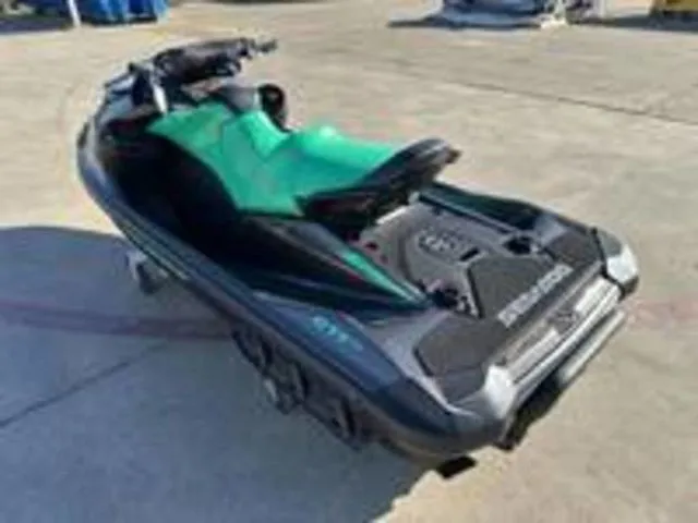 Slide: The Image of 2026 Sea-Doo GTI SE 130 jet ski parked on concrete surface. - 6