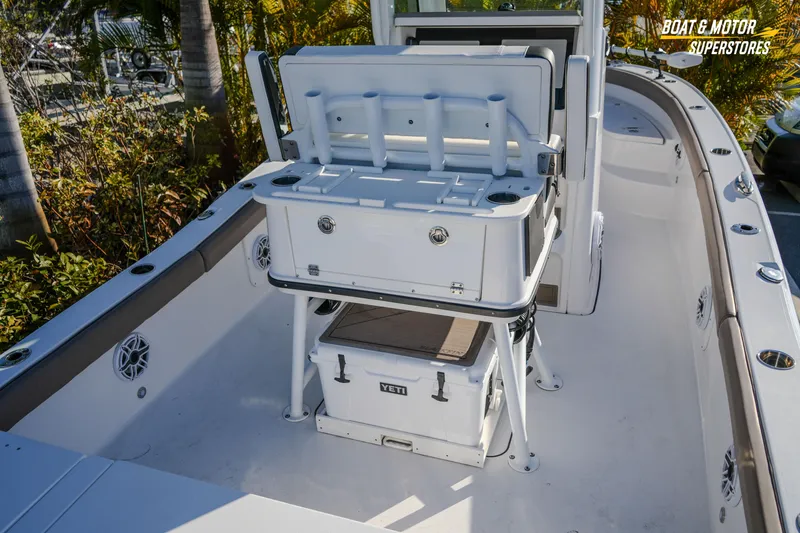 Slide: The Image of 2025 Blackfin 242 HB boat interior with storage and seating features. - 20