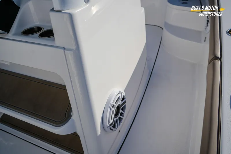 Slide: The Image of 2025 Blackfin 242 HB boat interior with speaker and cup holders. - 31