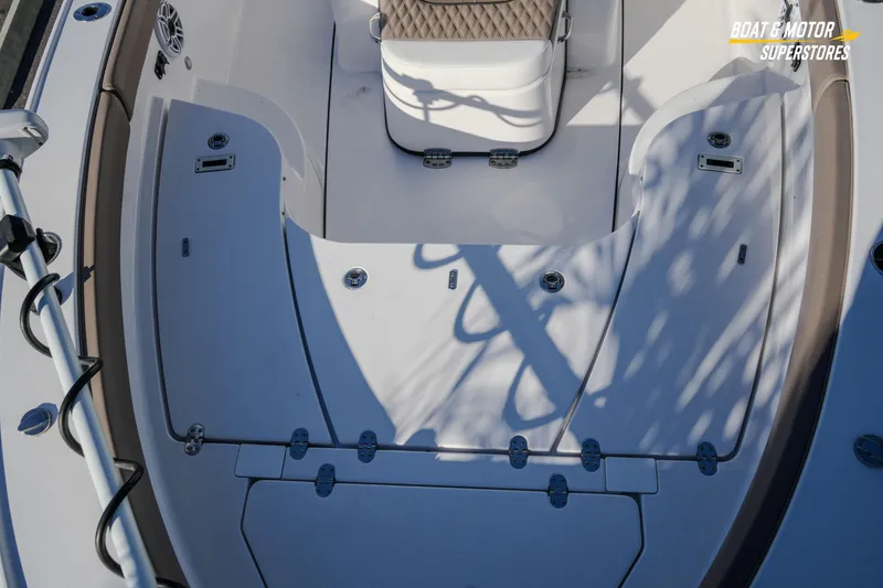 Slide: The Image of 2025 Blackfin 242 HB boat interior with seating and storage compartments. - 36