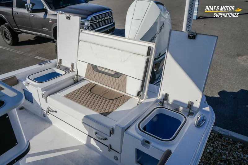 Slide: The Image of 2025 Blackfin 242 HB boat interior with seating and storage compartments. - 53