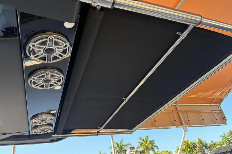 Slide: The Image of 2024 Nor-Tech 400 Supersport boat speakers and canopy, showcasing sleek design and functionality. - 19
