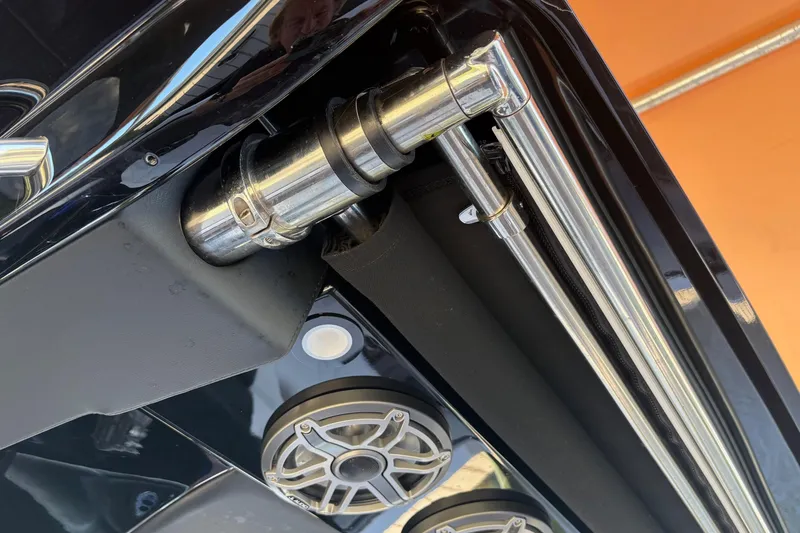 Slide: The Image of 2024 Nor-Tech 400 Supersport boat detail with speakers and stainless steel fittings. - 20