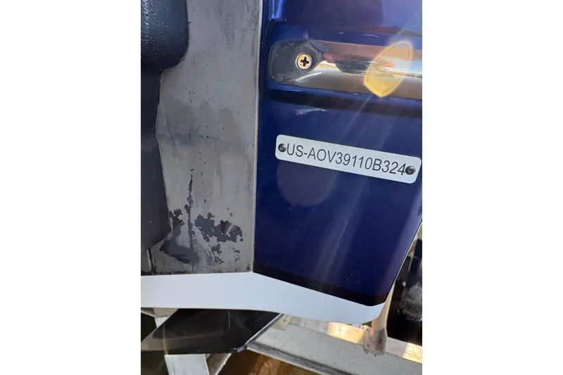 Slide: The Image of 2024 Nor-Tech 400 Supersport boat identification number plate close-up. - 21