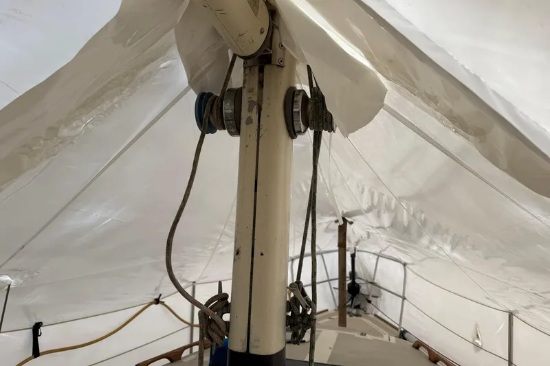 Slide: The Image of Interior view of a 1979 O'Day 37 sailboat mast under protective cover. - 28