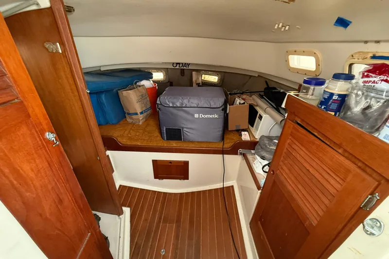 Slide: The Image of 1979 O'Day 37 sailboat interior with storage and equipment. - 8