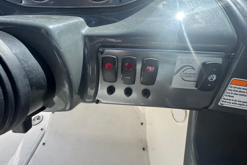 Slide: The Image of Control panel of a 2012 Yamaha Boats SX190 with cruise assist feature. - 23