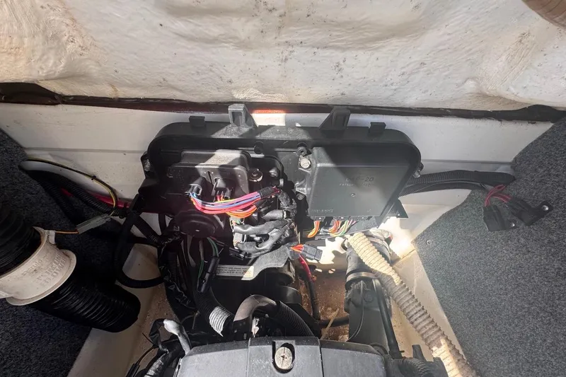 Slide: The Image of Engine compartment of a 2012 Yamaha Boats SX190, showing wiring and components. - 37