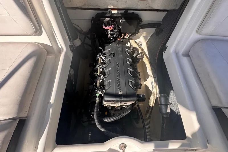 Slide: The Image of 2012 Yamaha Boats SX190 engine compartment, showcasing high output engine components. - 38