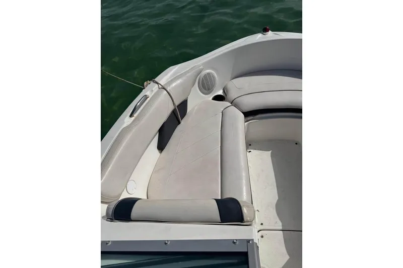 Slide: The Image of 2012 Yamaha Boats SX190 docked at North Beach Marina under clear skies. - 8