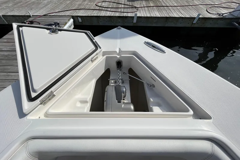 Slide: The Image of 2020 Jupiter 34 Center Console anchor compartment open at dock. - 16