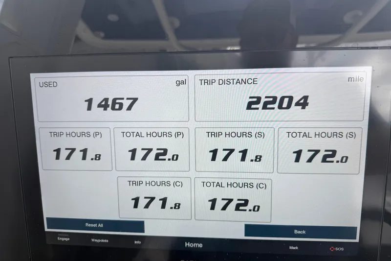 Slide: The Image of Display screen showing fuel usage and trip data for 2020 Jupiter 34 Center Console. - 22
