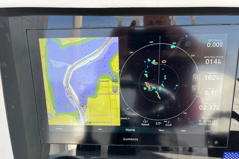Slide: The Image of Garmin marine navigation display on 2020 Jupiter 34 Center Console boat. - 25