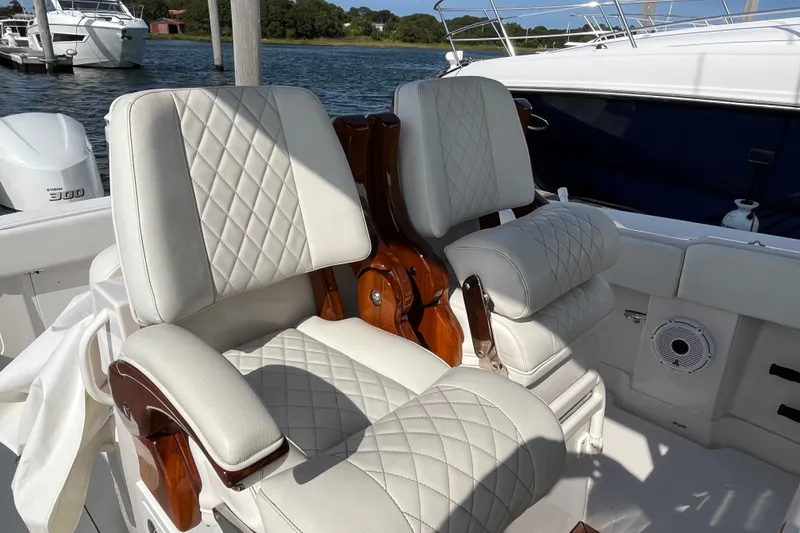 Slide: The Image of Luxurious seating on 2020 Jupiter 34 Center Console boat with quilted upholstery. - 30