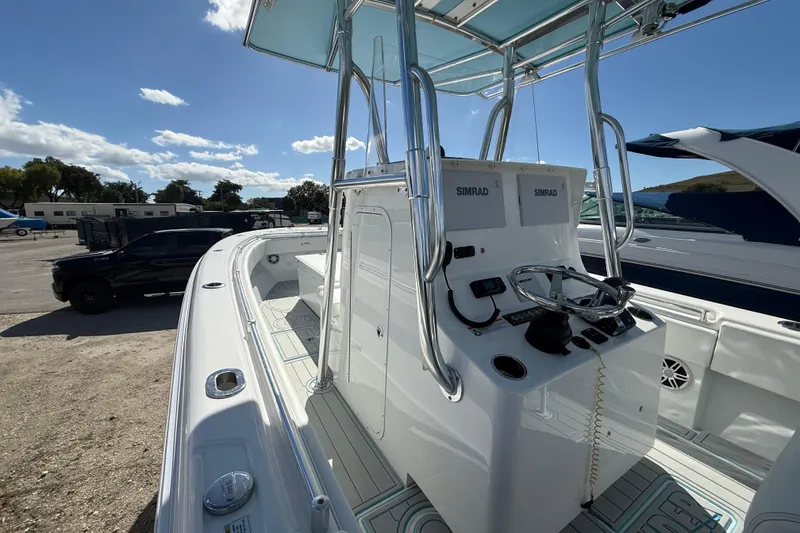 Slide: The Image of 2024 Contender 28 Tournament boat with advanced navigation system and sleek design. - 2