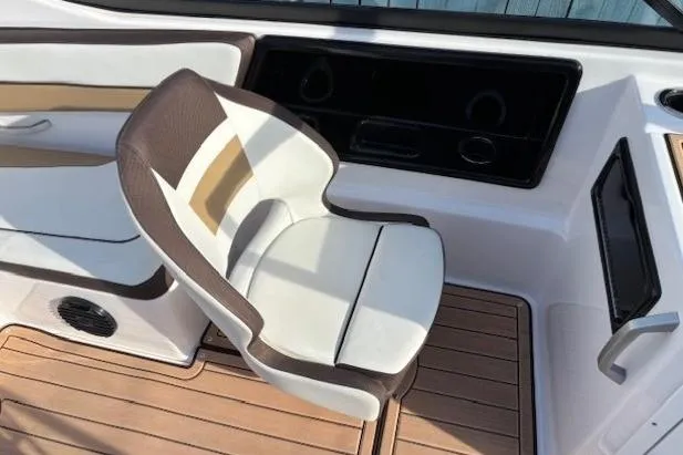 Slide: The Image of 2023 Yamaha Boats 195S interior with stylish seating and modern dashboard design. - 20