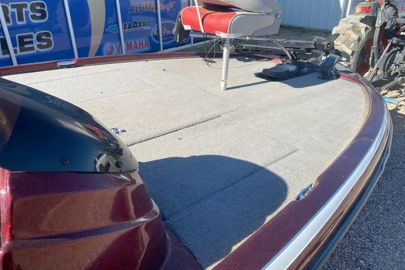 Slide: The Image of 2009 Nitro X-5 boat deck with seating and equipment, displayed outdoors. - 9