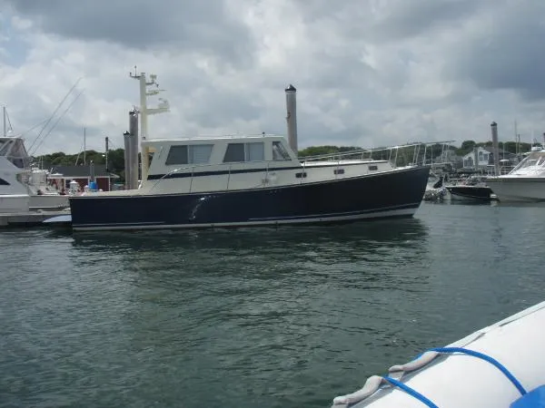Slide: The Image of Ellis Extended Top Cruiser 2000 - 2