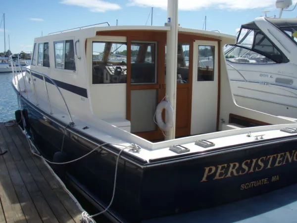 Slide: The Image of Ellis Extended Top Cruiser 2000 - 6