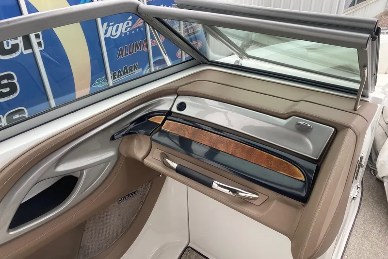 Slide: The Image of Interior of a 2008 Cobalt 272 boat, featuring sleek design and wood accents. - 8