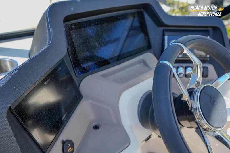 Slide: The Image of 2024 Avalon Twin Quad Lounger Windshield dashboard with steering wheel and digital displays. - 27