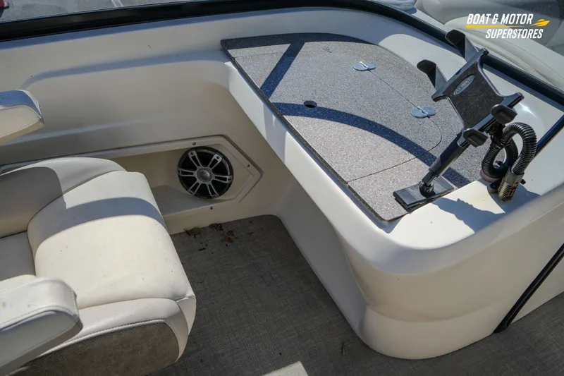 Slide: The Image of 2024 Avalon Twin Quad Lounger Windshield interior with seating and speaker detail. - 29