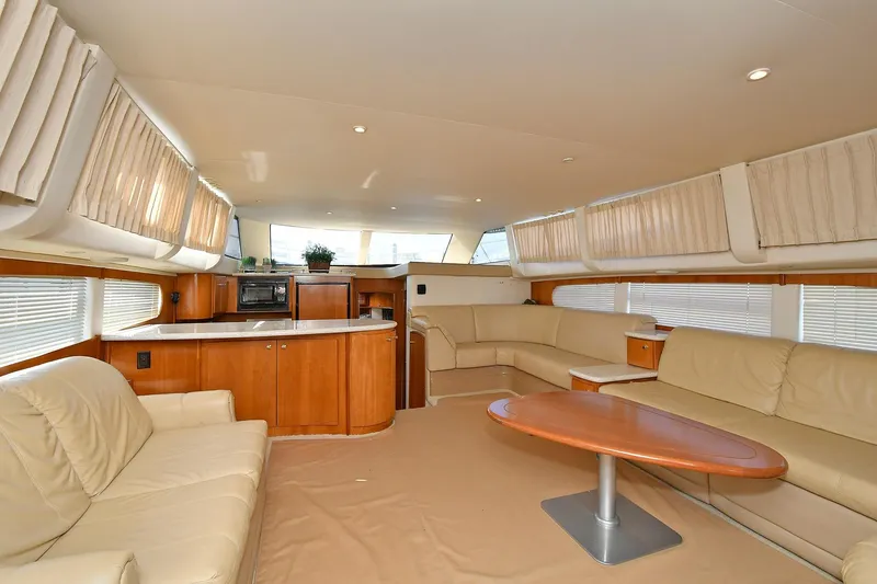 Slide: The Image of Luxurious interior of 2001 Carver 466 Motor Yacht with leather seating and modern amenities. - 26