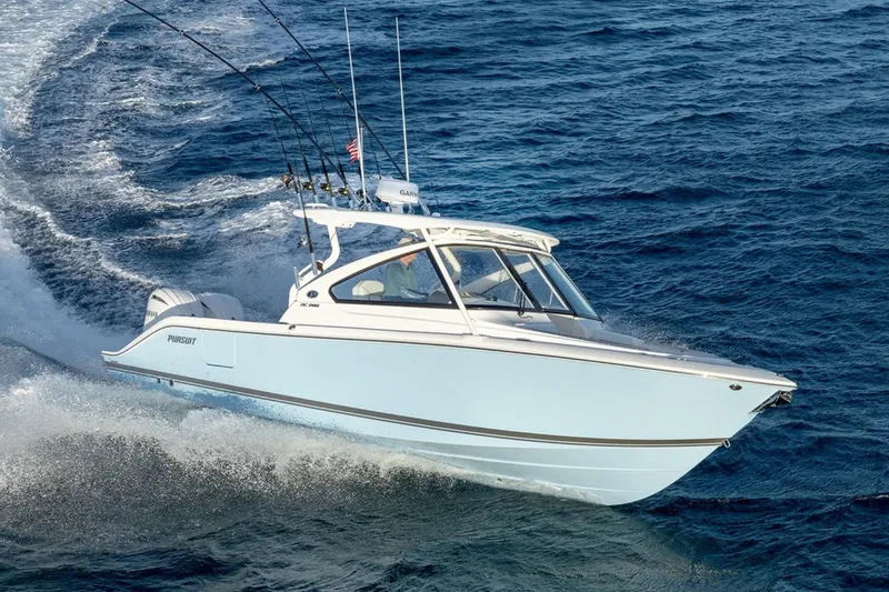 The Image of 2026 Pursuit DC 286 Dual Console boat cruising on open water. - 0