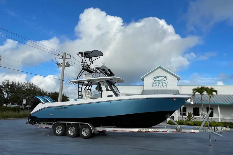 The Image of 2022 Everglades 335 Center Console boat on trailer at HMY Yachts dealership. - 0