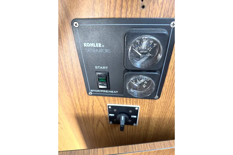 Slide: The Image of Kohler generator control panel on 1974 Bertram 35 Convertible boat. - 19