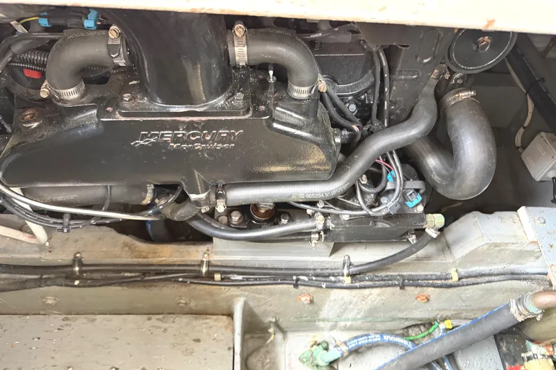 Slide: The Image of Engine compartment of a 1974 Bertram 35 Convertible with Mercury Marine components. - 43