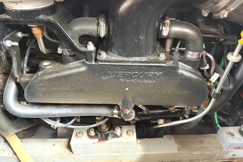 Slide: The Image of Mercury Marine engine in a 1974 Bertram 35 Convertible boat. - 44