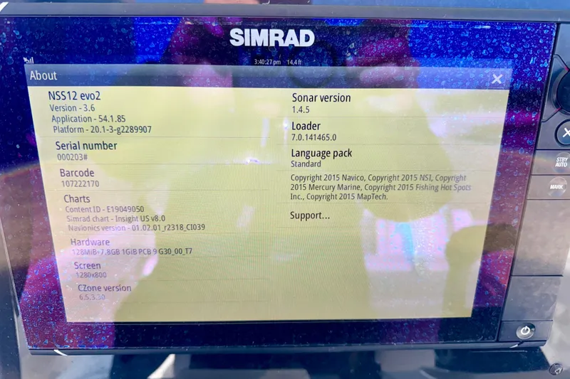 Slide: The Image of Simrad NSS12 evo2 display on 2017 Sea Hunt Triton 225 boat, showing system information. - 16