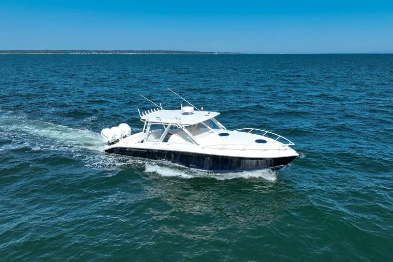 Slide: The Image of 2007 Midnight Express 37 Cabin cruising on open blue waters. - 1